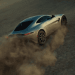Aston Martin Vantage driving fast in the desert