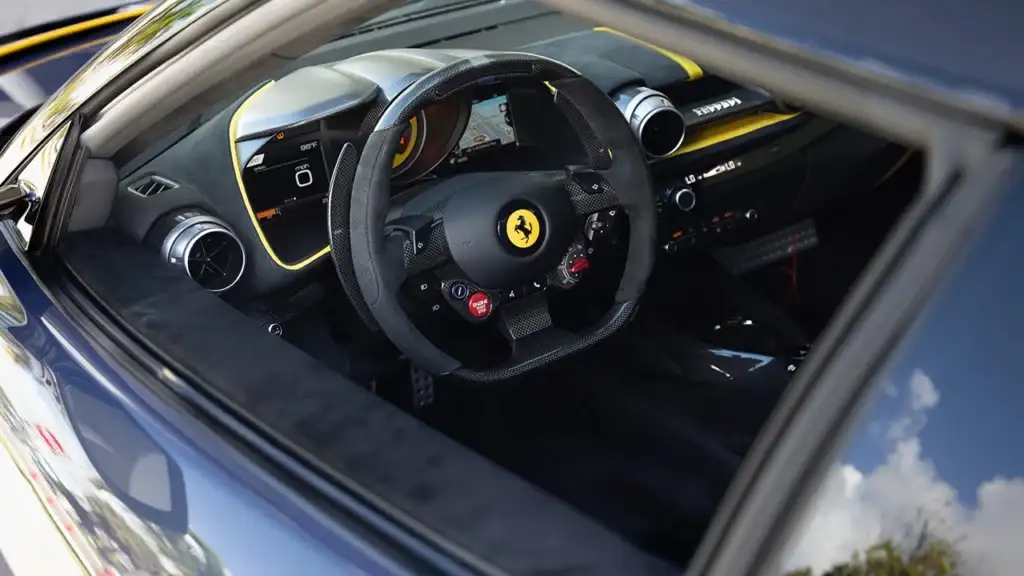 Ferrari ownership cost | steering wheel