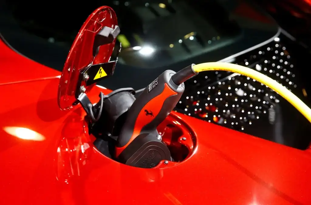 red hybrid ferrari charging