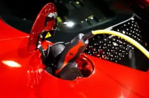 red hybrid ferrari charging