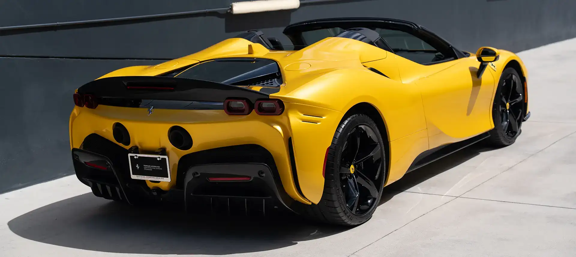 yellow ferrari spider