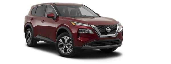 A red 2021 Nissan Rogue is shown from the left.