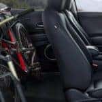 The black interior with a bike in the back seat is shown on a 2020 Honda HR-V.