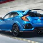 A blue 2020 Honda Civic Type R is shown from the rear at an angle.