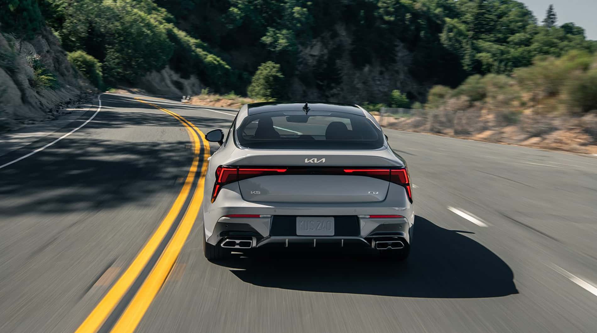 K5 Driving down the road reverse angle