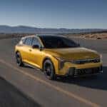 Kia K4 hatchback driving