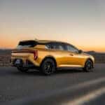 Kia K4 hatchback driving