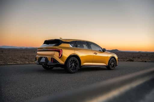 Kia K4 hatchback driving
