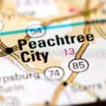 A close up is shown of road map showing Peachtree City.