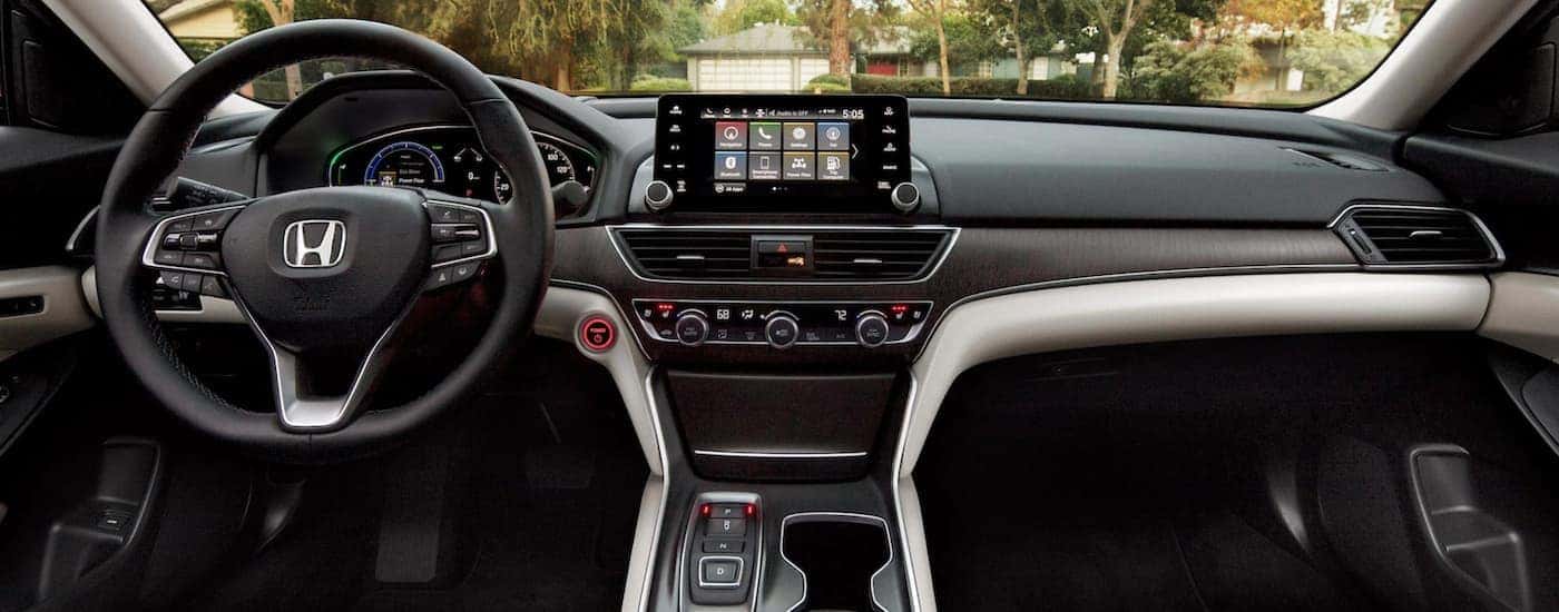Steering wheel and infotainment screen inside a 2021 Honda Accord Hybrid Touring