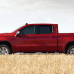 2020 Silverado 1500 in field next to man
