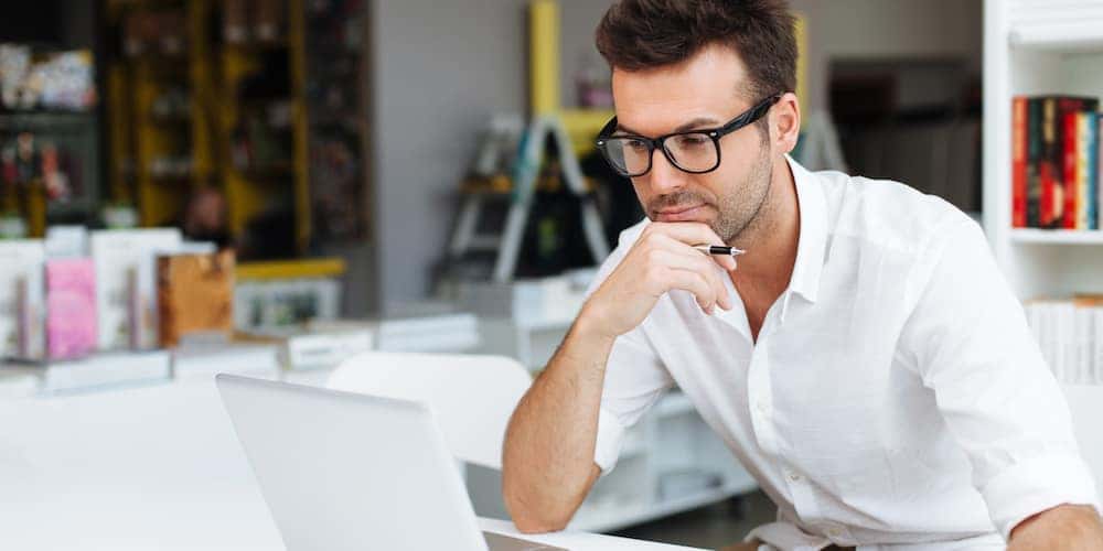 Man Shopping for a Car Online