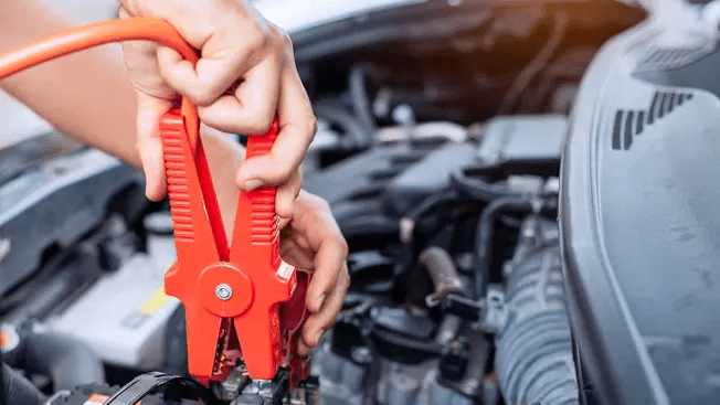Jumper Cables on Car Battery