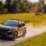 2025 Nissan Rogue on a dirt road
