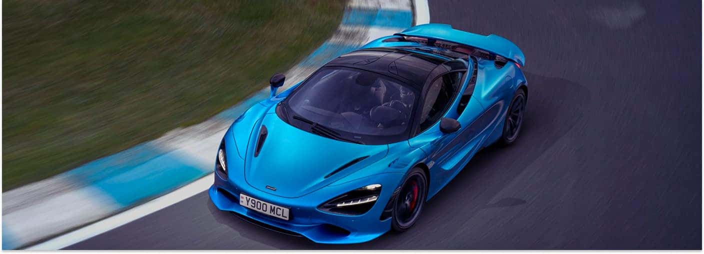 Bright Blue 2026 McLaren 750S Driving on Racetrack
