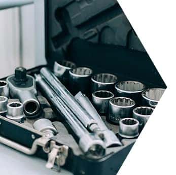 Basic Car Maintenance and Servicing Checklist | Performance Chevrolet | Close-up of socket wrench and parts in tool box