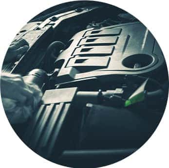 Difference between synthetic oil & conventional oil at Performance Chevrolet | Close-up of engine bay