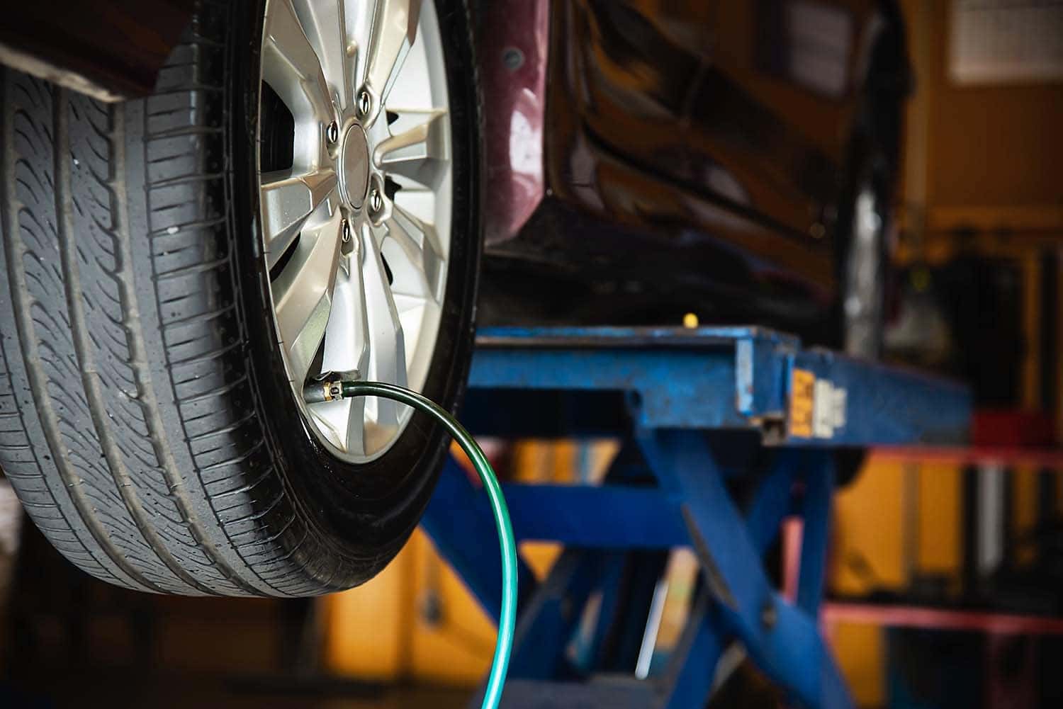 How to check your tires' health at Performance Chevrolet | Service technician checking tire pressure