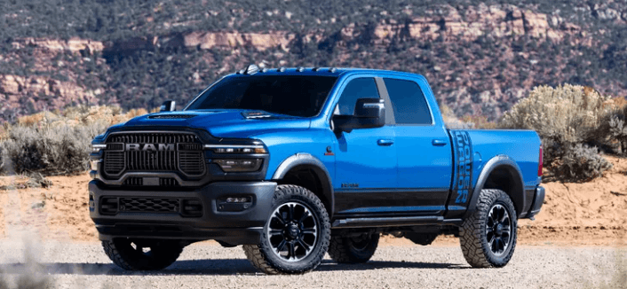 Blue Ram Heavy Duty pickup shown on a desert road