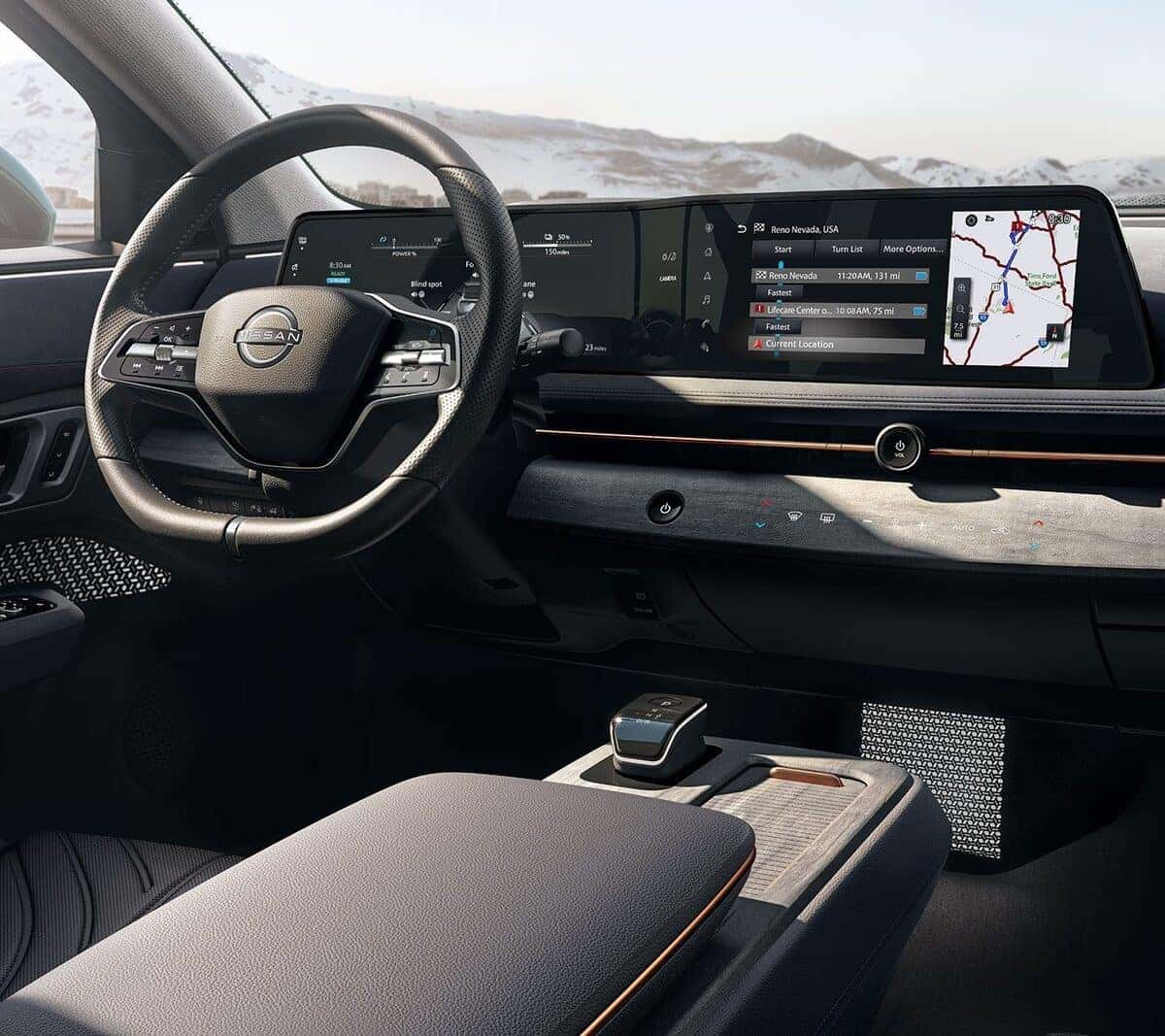 Over-the-shoulder view of man driving Nissan vehicle