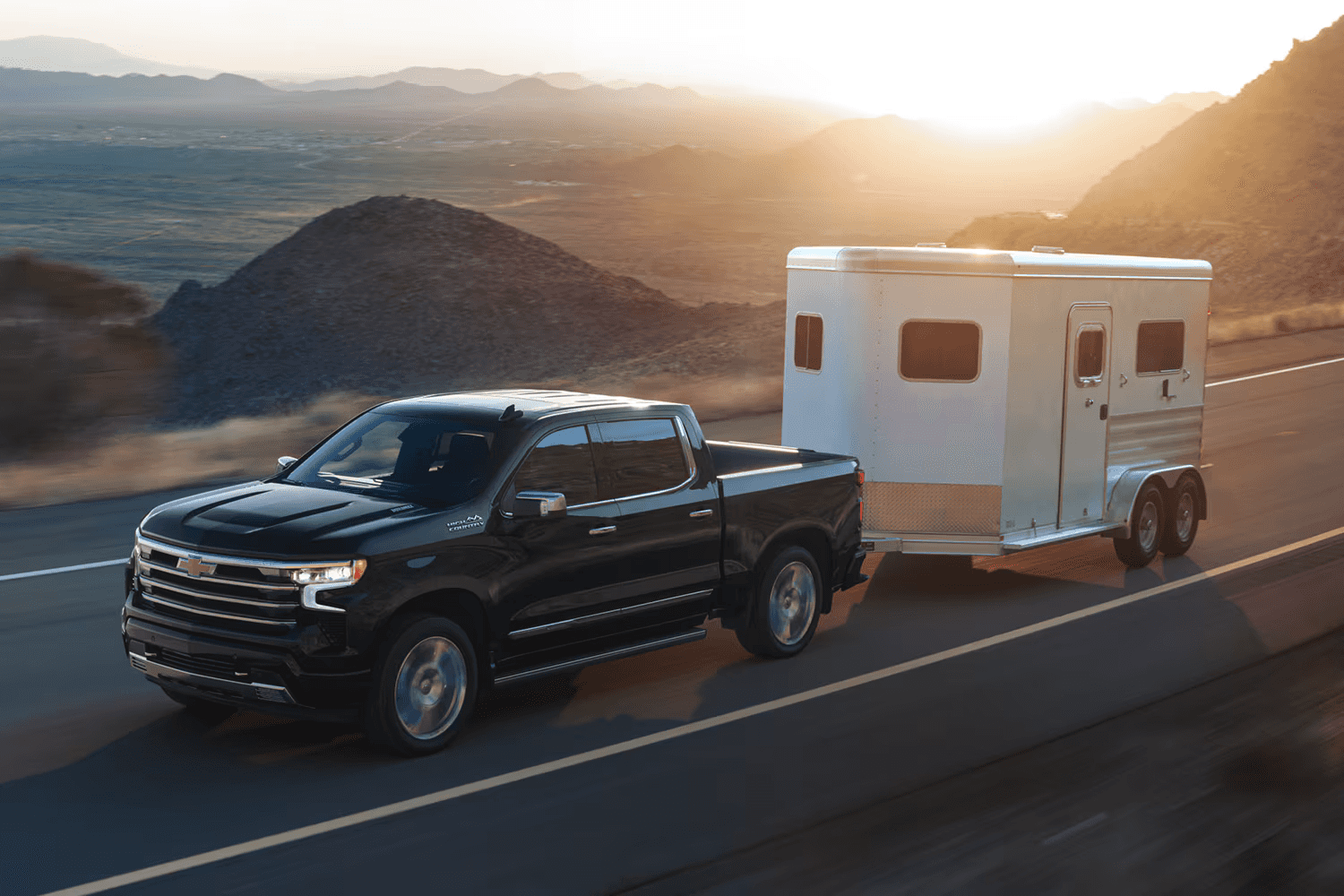 Black 2026 Chevy Silverado towing 