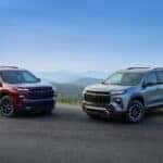 Two 2026 Chevrolet Travers SUVs with a 3/4 front view